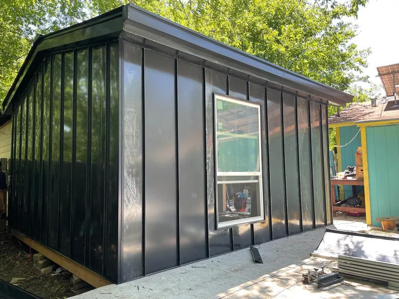 Black standing seam metal wall panels for Metal Roof Installation in Plover