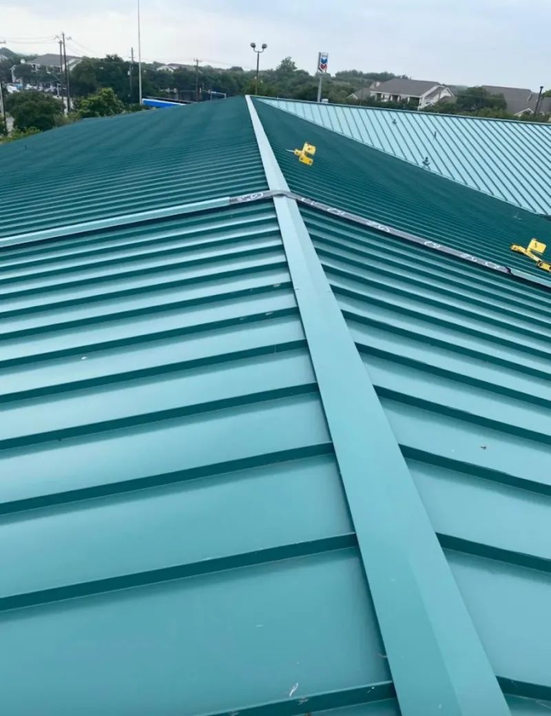 Green commercial metal roof ridge and valley for Metal Roof Repair in Plover