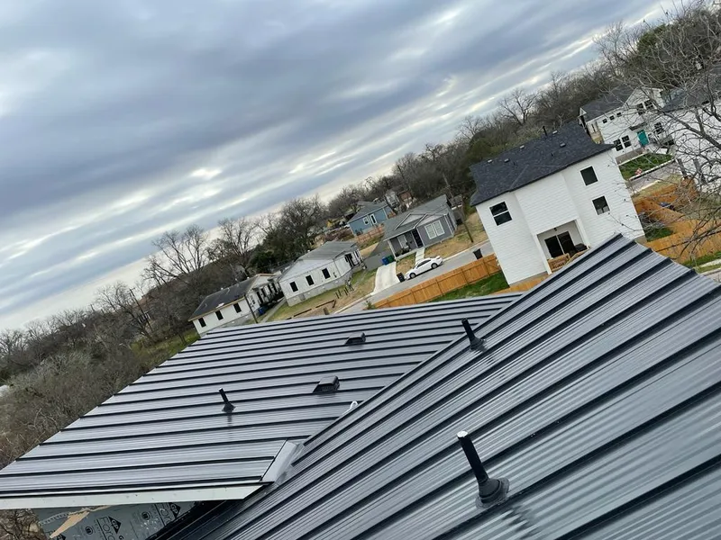 Standing seam metal roof panels with vents for Skylight Repair in Plover